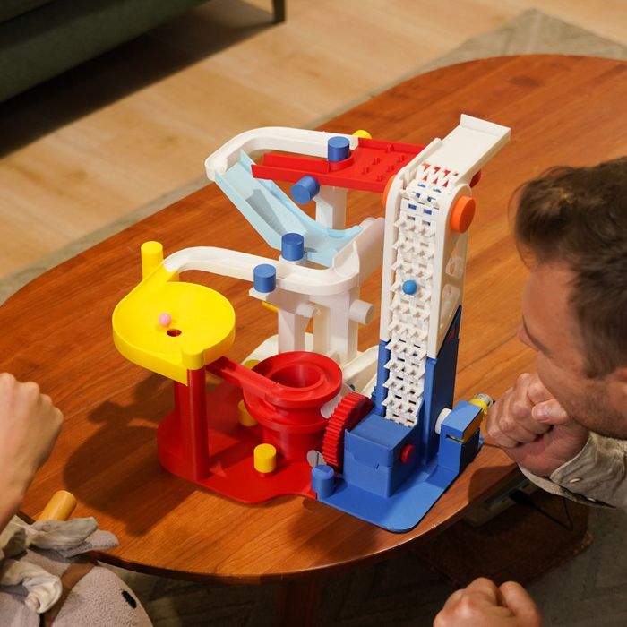 Bambu Lab Marble Run Components Kit with various colorful plastic pieces for building marble tracks and structures.