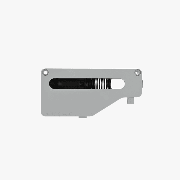 Bambu Lab filament buffer AMS part showing a compact black-colored component for 3D printer filament management