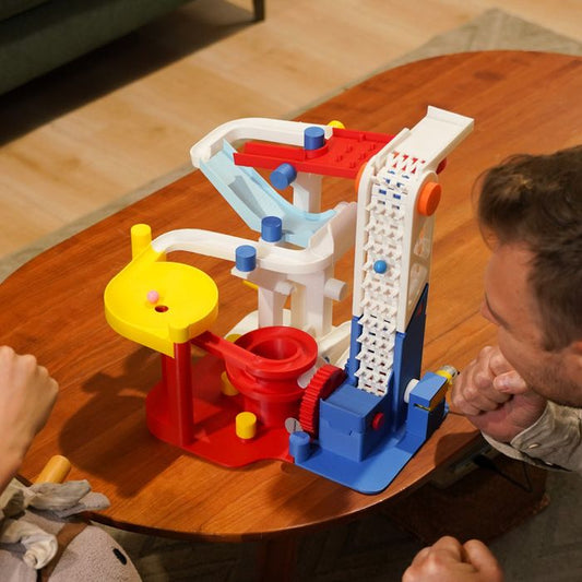 Bambu Lab Marble Run Components Kit with various colorful plastic pieces for building marble tracks and structures.