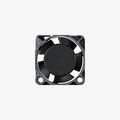Bambu Lab cooling fan for hotend on X1 Series 3D printer, black plastic with mounting blades for effective heat dissipation.