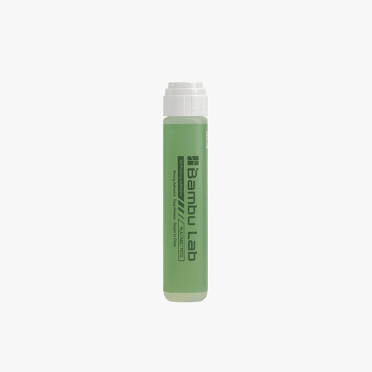 Bambu Lab Liquid Glue for Build Plate, a clear adhesive in a bottle, used for improving 3D print adhesion on build surfaces.