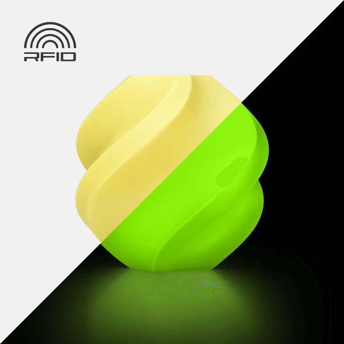 Bambu PLA Glow - Yellow 3D-printed color sample, shown in daylight and glowing in the dark
