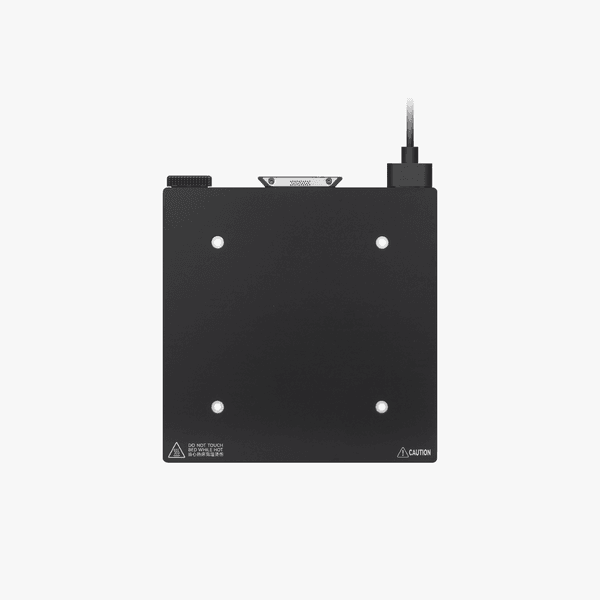 Bambu Lab heatbed unit for 3D printers, showing a flat, rectangular printer part with mounting holes and textured surface.