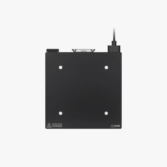 Bambu Lab heatbed unit for 3D printers, showing a flat, rectangular printer part with mounting holes and textured surface.