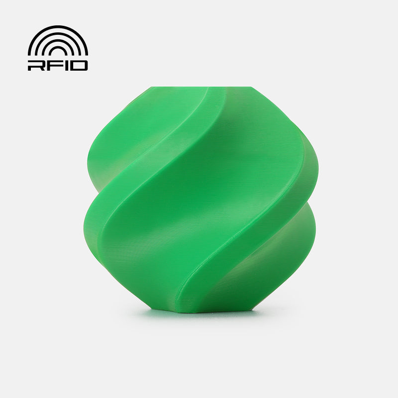 Green Bambu Lab PETG Basic filament spool, ideal for 3D printing with durable, high-quality PETG material.