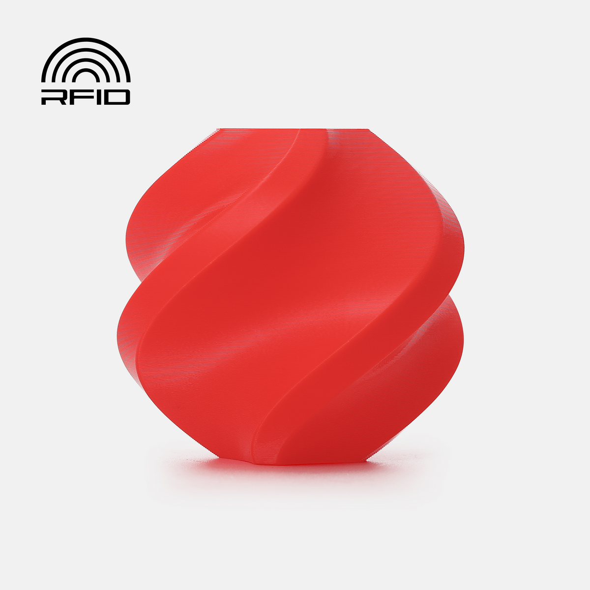 Red Bambu Lab PETG Basic Filament spool for 3D printing, showing the filament coil and packaging.