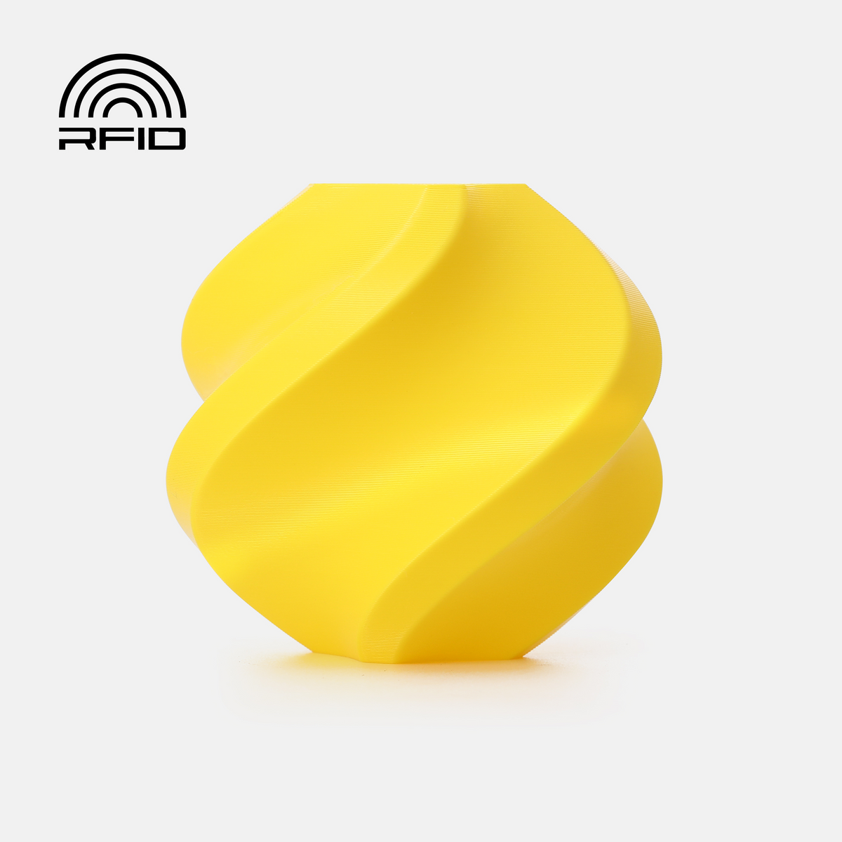 Yellow Bambu Lab PETG Basic filament spool for 3D printing, showing the filament reel with the Bambu Lab branding.